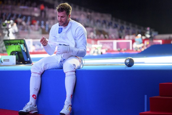 epa09363314 Switzerland&#039;s Benjamin Steffen looks desapointed after loosing against Ukraine&#039;s Igor Reizlin during the men&#039;s epee fencing individual round of 32 competition at the 2020 To ...