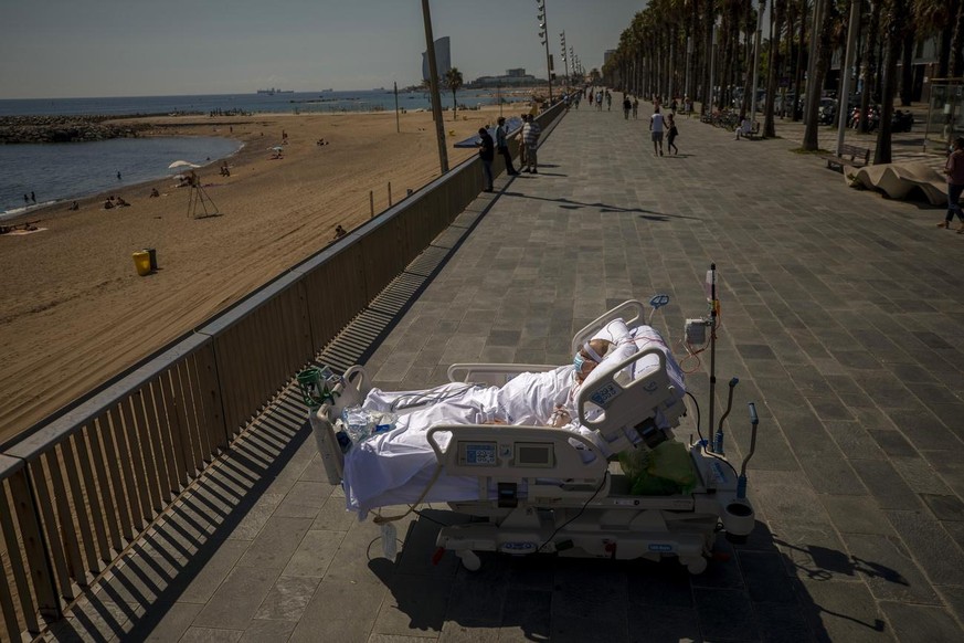 Francisco Espana, 60, looks at the Mediterranean sea from a promenade next to the &quot;Hospital del Mar&quot; in Barcelona, Spain, Friday, Sept. 4, 2020. Francisco spent 52 days in the Intensive Care ...