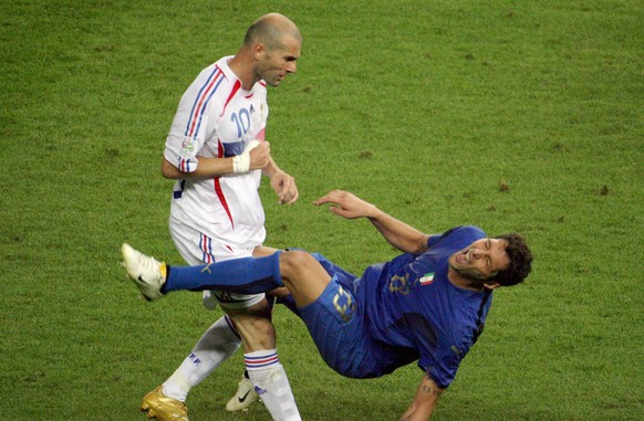 Berlin, GERMANY: A photo taken 09 July 2006 shows French midfielder Zinedine Zidane (L) gesturing after head-butting Italian defender Marco Materazzi during the World Cup 2006 final football match bet ...