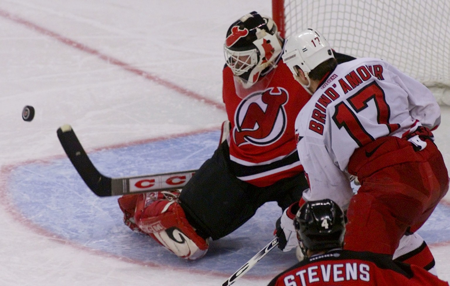 New Jersey Devils goalkeeper Martin Brodeur blocks a shot by Carolina Hurricanes&#039; Rod Brind&#039;Amour (17) during the third period of the Eastern Conference playoff game, Wednesday, April 18, 20 ...