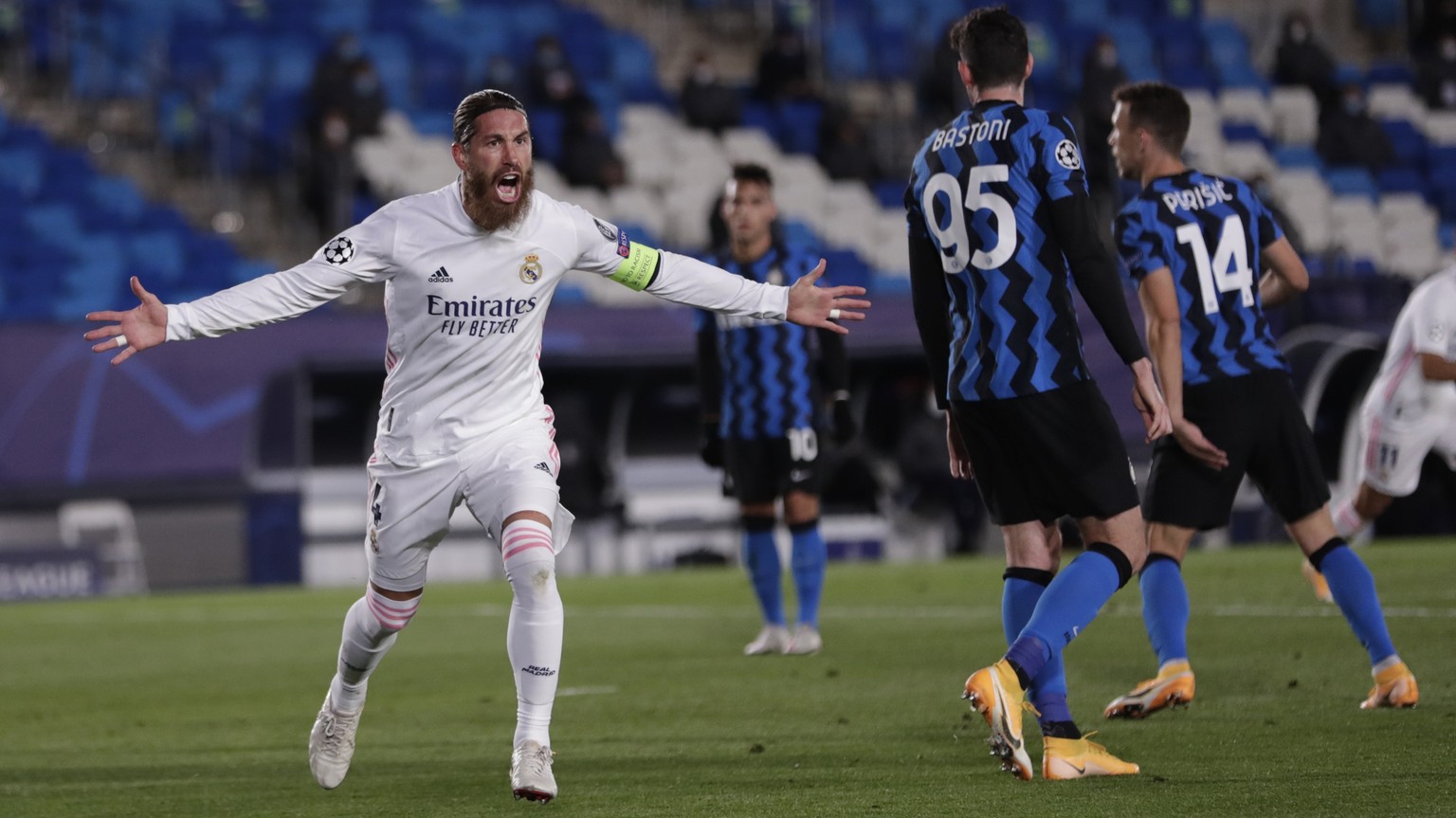 Real Madrid&#039;s Sergio Ramos celebrates after scoring his side&#039;s second goal during the Champions League group B soccer match between Real Madrid and Inter Milan at the Alfredo Di Stefano stad ...
