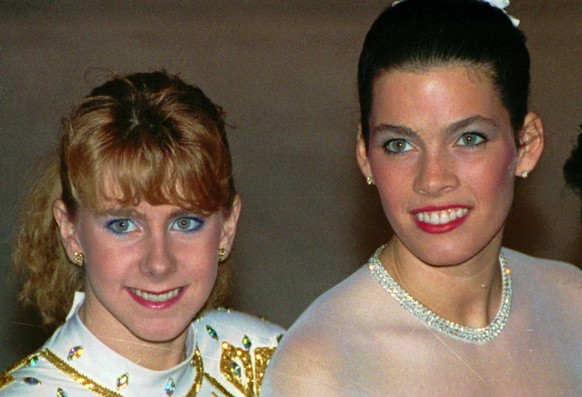 ADVANCE FOR MONDAY, DEC. 23 - FILE - In this Jan. 12, 1992, file photo, Tonya Harding, left, and Nancy Kerrigan appear at the U.S. Figure Skating Championships in Orlando, Fla. It&#039;s been nearly 2 ...