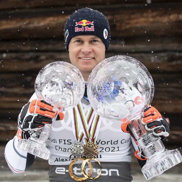 Alexi Pinturault of France poses after winning the men?s overall crystal globe and overall slalom globe at the FIS Alpine Skiing World Cup finals, in Parpan-Lenzerheide, Switzerland, Sunday, March 21, ...