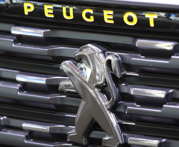 epa08780614 (FILE) - A logo of PSA Group&#039;s Peugeot automobile at the IAA Commercial Vehicles fair in Hannover, northern Germany, 20 September 2018 (reissued 28 October 2020). PSA Group on 28 Octo ...