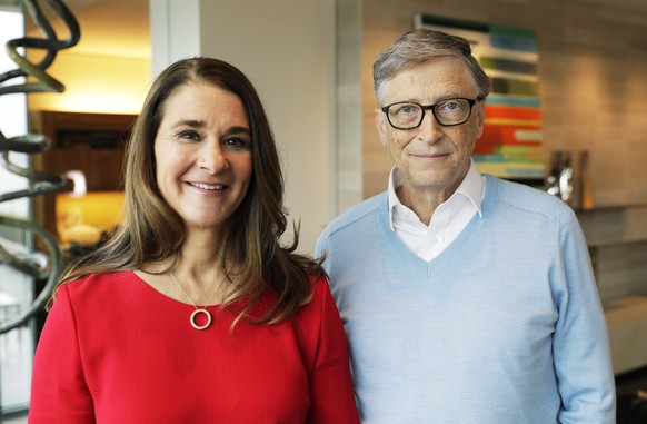 In this Feb. 1, 2018 photo, Microsoft co-founder Bill Gates and his wife Melinda pose for a photo before an interview with The Associated Press in Kirkland, Wash. Gates and his wife, head the Bill and ...