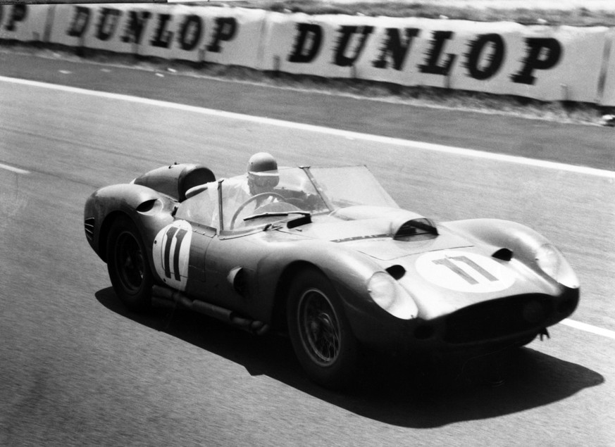 The Ferrari of the Belgian drivers Olivier Gendebien and Paul Frere, roars past the stands during the final laps of the gruelling 24 hour sports car endurance race at Le Mans, France on June 26, 1960. ...