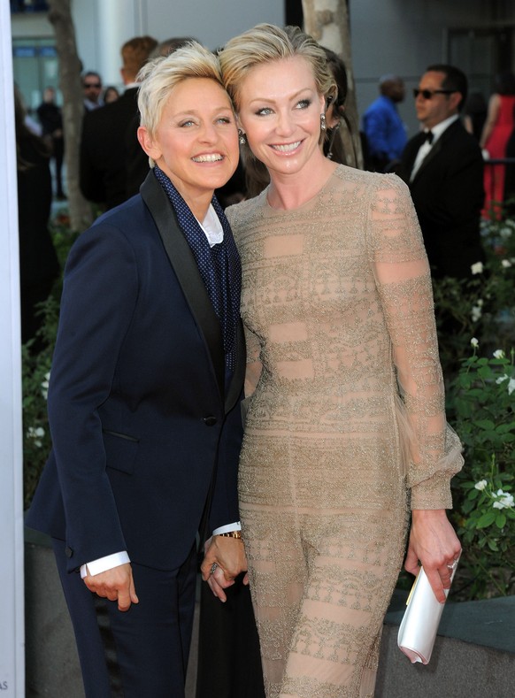 Actresses Ellen DeGeneres, left and Portia de Rossi arrives at the 64th Primetime Emmy Awards at the Nokia Theatre on Sunday, Sept. 23, 2012, in Los Angeles. (Photo by Jordan Strauss/Invision/AP)