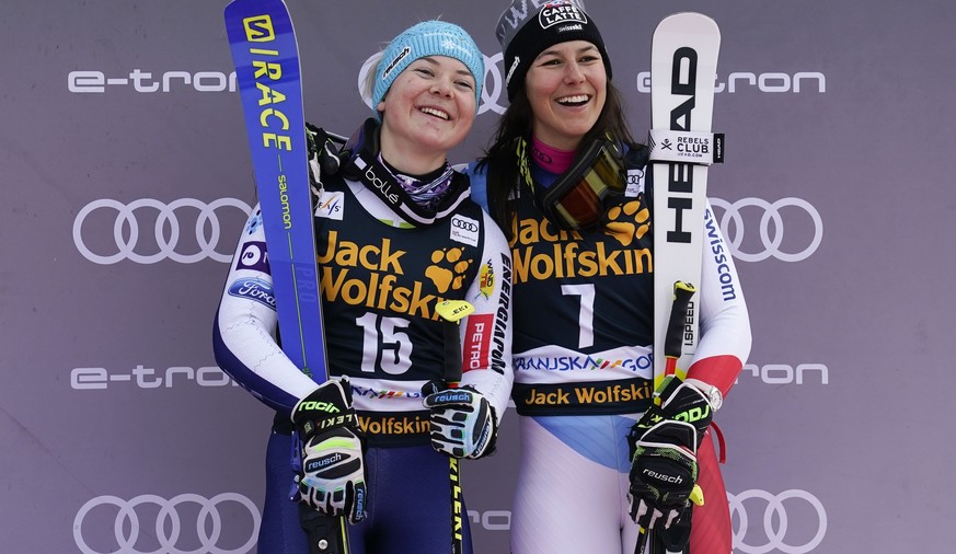 Slovenia&#039;s Meta Hrovat, left, and Switzerland&#039;s Wendy Holdener celebrate taking third place in an alpine ski, women&#039;s World Cup giant slalom, in Kranjska Gora, Slovenia, Saturday, Feb.  ...