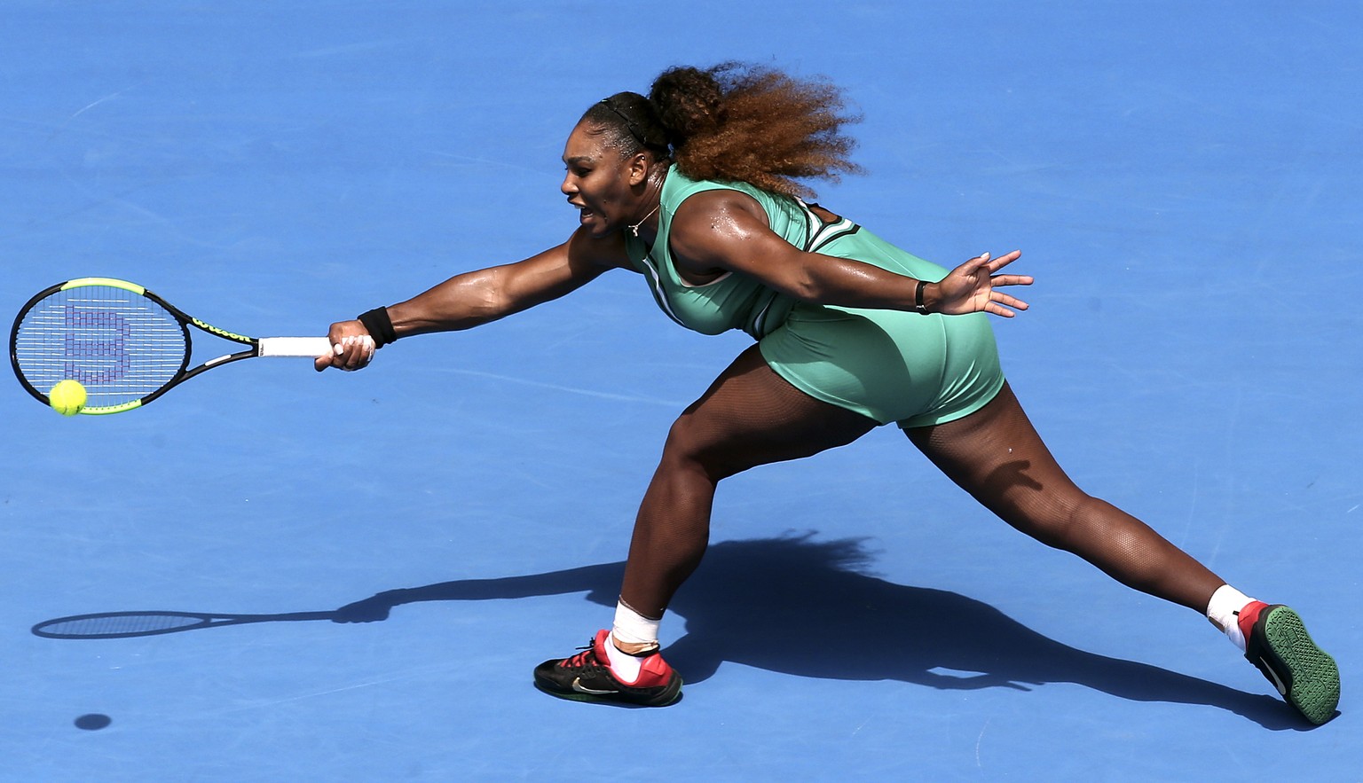 epaselect epa07284772 Serena Williams of the United States in action against Tatjana Maria of Germany during their women&#039;s singles match on day two of the Australian Open in Melbourne, Australia, ...