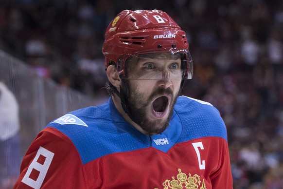 Team Russia&#039;s Alex Ovechkin reacts as he celebrates a goal by Vladimir Tarasenko (not shown) against Team Finland during second period World Cup of Hockey action in Toronto on Thursday, Sept. 22, ...