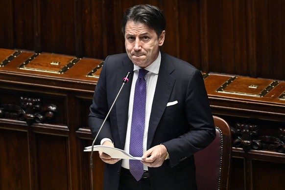 epa08546754 Italian Prime Minister Giuseppe Conte reacts as he delivers a speech at the Chamber of Deputies (Camera dei deputati) on the upcoming European Council meeting, in Rome, Italy, 15 July 2020 ...