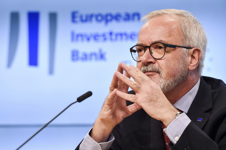 European Investment Bank President Werner Hoyer announces the 2017 EIB results during a media conference at the Europa building in Brussels on Thursday, Jan. 18, 2018. (AP Photo/Geert Vanden Wijngaert ...