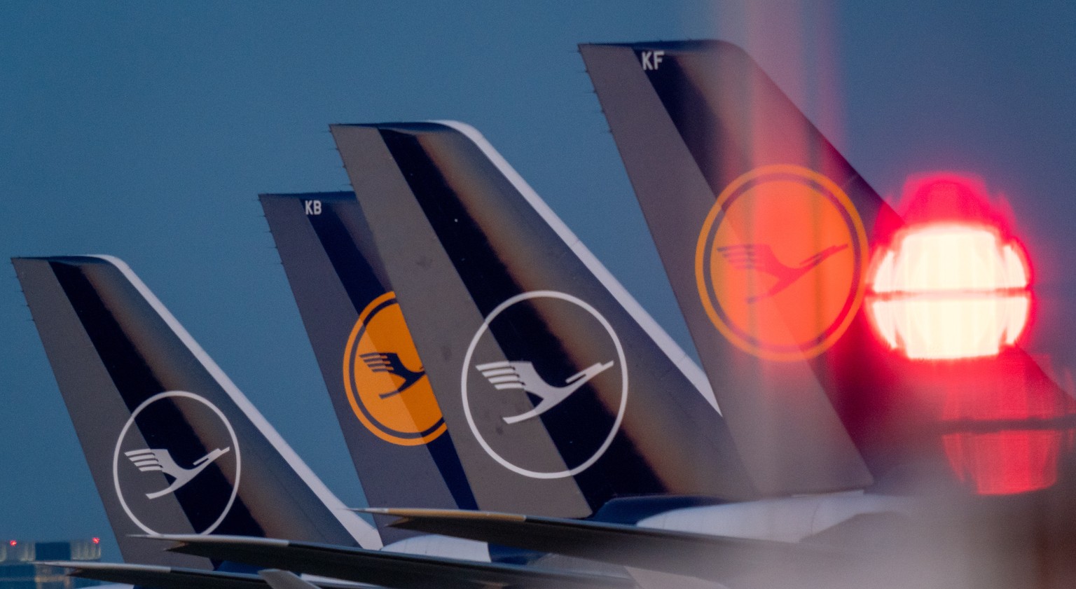 epa08380258 (FILE) - Lufthansa aircraft are parked on the North West runway at the Fraport International airport in Frankfurt/Main, Germany, 23 March 2020 (reissued 23 April 2020). German carrier Luft ...