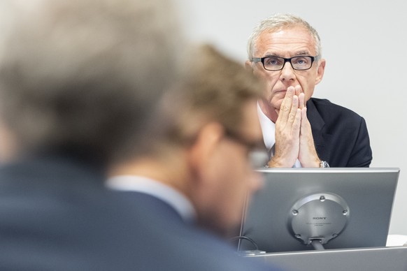 Urs Rohner, right, president of the board of Credit Suisse, speaks during a press conference of the Observation of Iqbal Khan in Zuerich, Switzerland, Tuesday, Oct. 1, 2019. (Ennio Leanza/Keystone via ...
