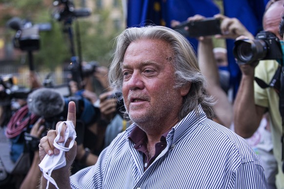 President Donald Trump&#039;s former chief strategist Steve Bannon speaks with reporters after pleading not guilty to charges that he ripped off donors to an online fundraising scheme to build a south ...