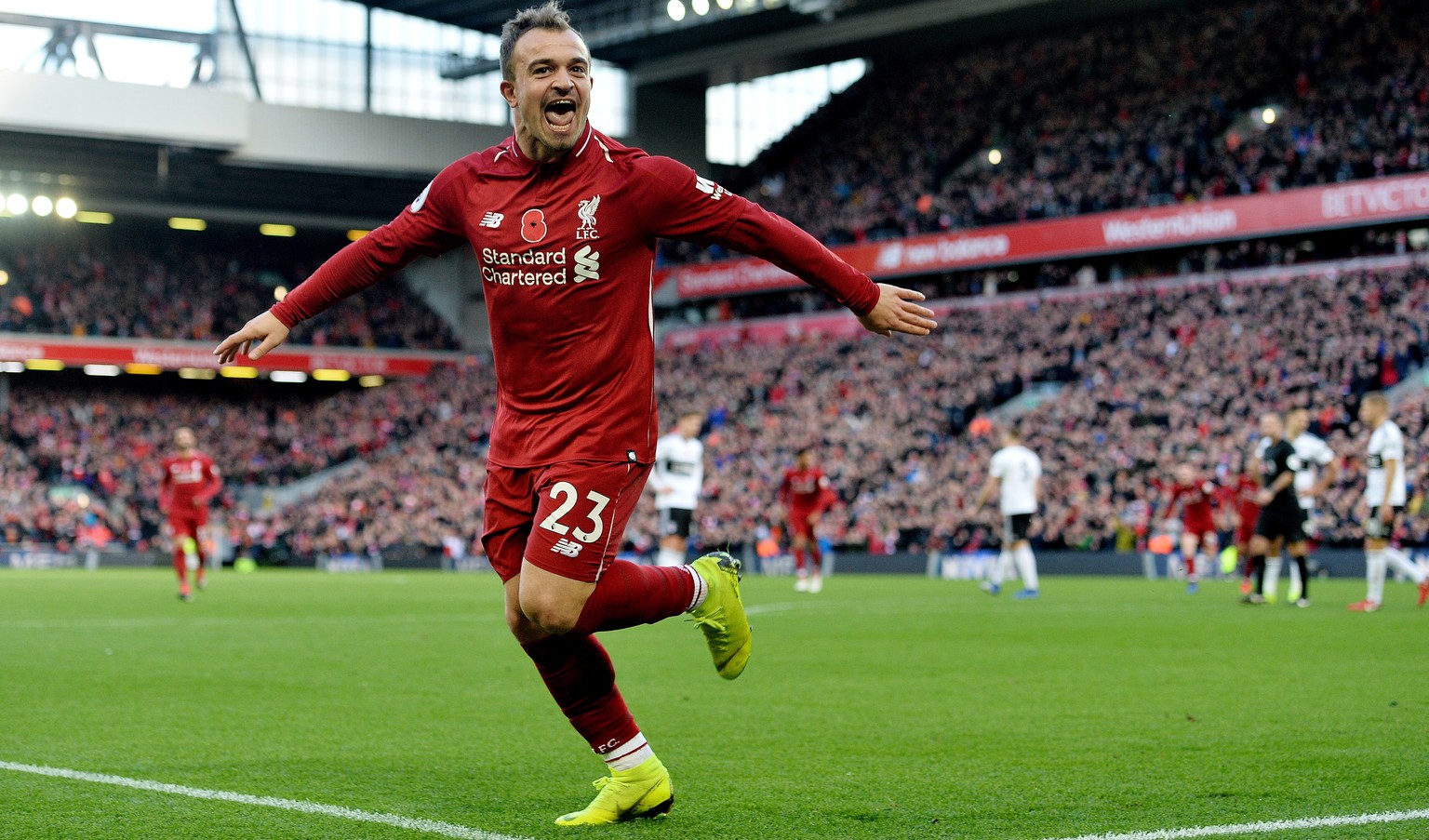 epa07158234 Liverpool&#039;s Xherdan Shaqiri celebrates scoring the second goal making the score 2-0 during the English Premier League soccer match between Liverpool and Fulham at the Anfield in Liver ...