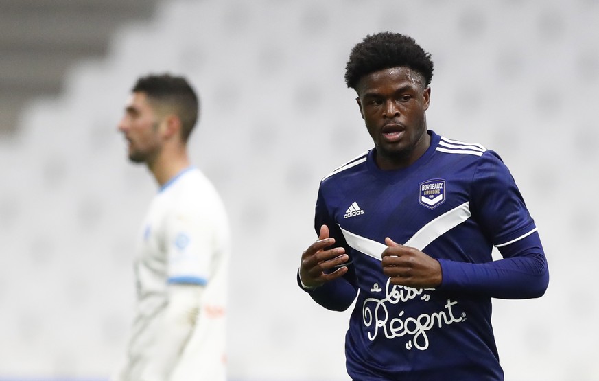 epa08754244 Girondins Bordeaux&#039;s Josh Maja (R) reacts after scoring his team&#039;s first goal during the French Ligue 1 soccer match between Olympique Marseille and Bordeaux at Orange Velodrome  ...