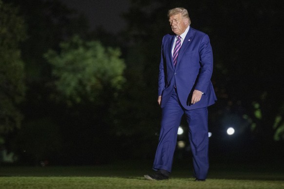 epa08802875 (FILE) - US President Donald J. Trump steps off Marine One and walks to the White House in Washington, DC, USA, 18 September 2020 (reissued 06 November 2020). According to media reports ci ...