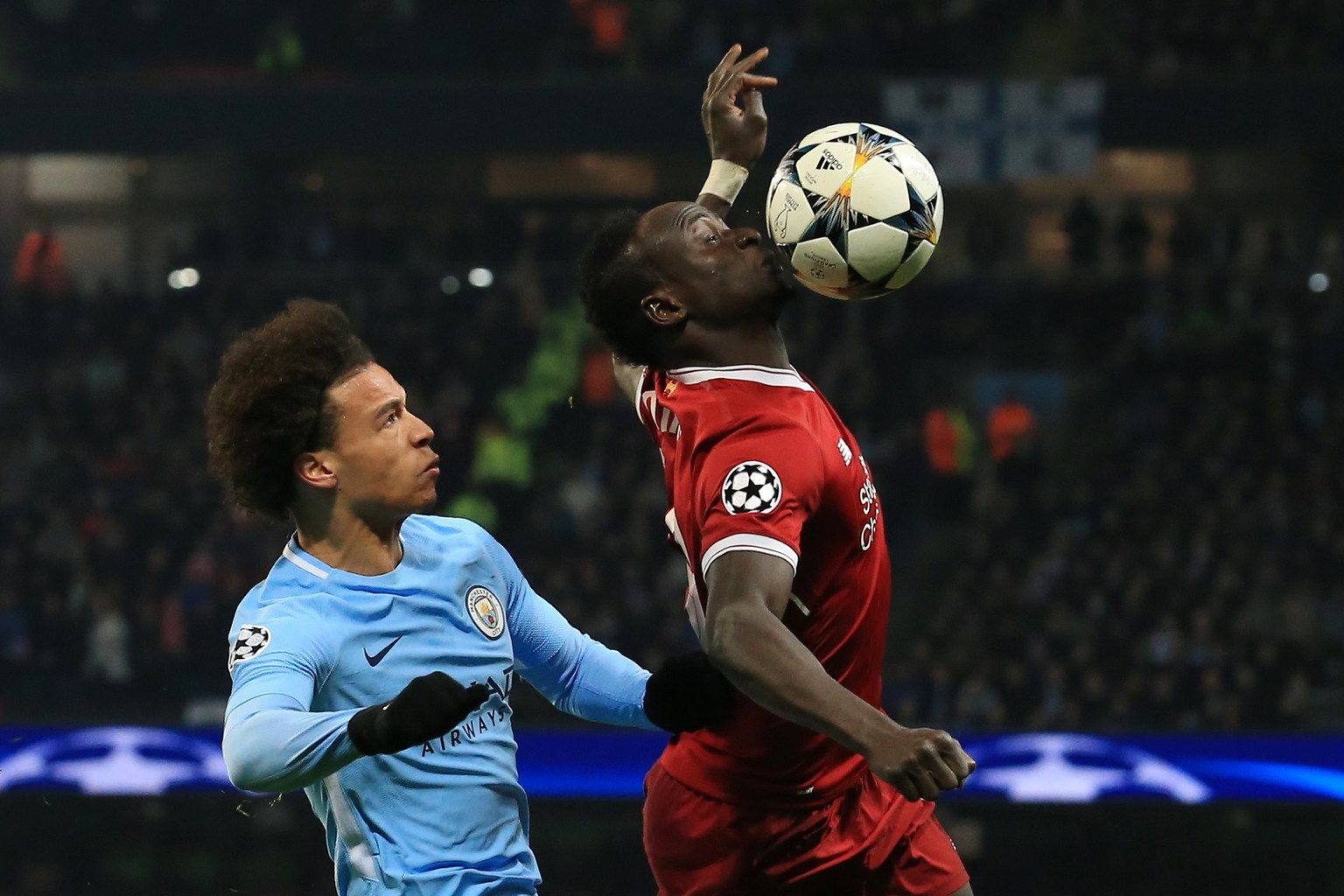 epa06660210 Manchester City&#039;s Leroy Sane (L) in action against Liverpool&#039;s Sadio Mane (R) during the UEFA Champions League quarter final second leg match between Manchester City and Liverpoo ...
