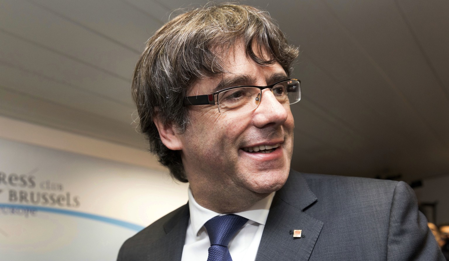 FILE - In this Tuesday, Oct. 31, 2017 file photo, ousted Catalan President Carles Puigdemont smiles after a press conference in Brussels. Puigdemont says he is ready to run for re-election in December ...