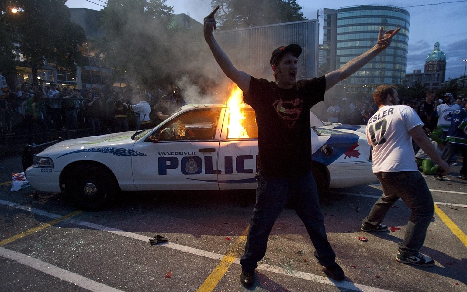 A police car burns during a riot in downtown Vancouver, British Columbia Wednesday, June 15, 2011 following the Vancouver Canucks 4-0 loss to the Boston Bruins in game 7 of the Stanley Cup hockey fina ...