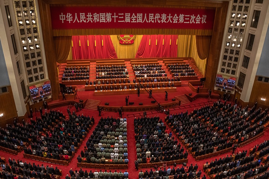 epa08449407 Delegates attend the closing ceremony of the third session of the 13th National People&#039;s Congress (NPC) at the Great Hall of the People in Beijing, China, 28 May 2020. The NPC runs pa ...