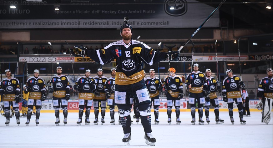 Ambri&#039;s player Jiri Novotny celebrates the victory with geyser dance afterthe regular season game of the National League Swiss Championship 2018/19 between HC Ambri Piotta and HC Davos at the ice ...