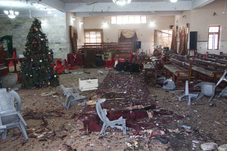 epa06394769 A view of the destruction caused after a suicide bomb attack at a Christian church, in Quetta, Pakistan, 17 December 2017. Reportedly at least eight people were killed and 25 others injure ...