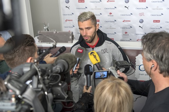 Valon Behrami speaks during a press conference of Switzerland&#039;s national soccer team at the St. Jakob-Park stadium in Basel, Switzerland, on Tuesday, November 7, 2017. Switzerland will face North ...