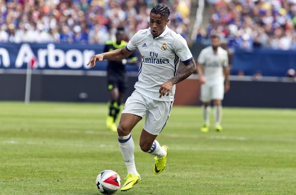 FILE- In this July 30, 2016 file photo, Real Madrid forward Mariano Diaz Mejia dribbles the ball in the first half of an International Champions Cup soccer match against Chelsea in Ann Arbor, Mich. St ...