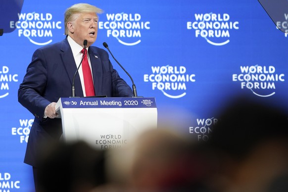 US President Donald Trump addresses a plenary session during to the 50th annual meeting of the World Economic Forum, WEF, in Davos, Switzerland, Tuesday, January 21, 2020. The meeting brings together  ...