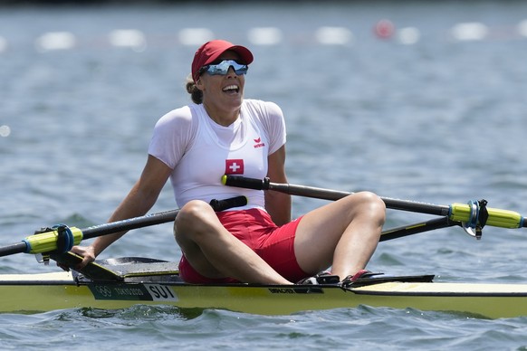 Jeannine Gmelin of Switzerland reacts after competing in the women&#039;s rowing single sculls semifinal at the 2020 Summer Olympics, Thursday, July 29, 2021, in Tokyo, Japan. (AP Photo/Darron Cumming ...