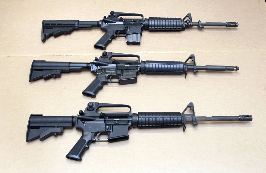 FILE - In this Aug. 15, 2012 file photo, three variations of the AR-15 rifle are displayed at the California Department of Justice in Sacramento, Calif. On Sept. 19, 2019, Connecticut-based Colt Firea ...