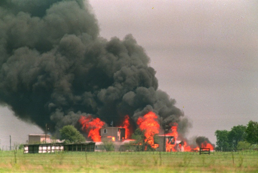 FILE--The Branch Davidian compound in Waco, Texas, is shown engulfed by flames in this April 20, 1993, file photo. Federal marshals were dispatched Wednesday to the FBIÕs headquarters to impound previ ...
