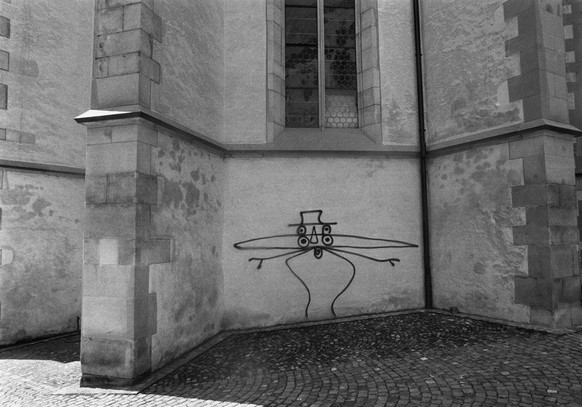 Graffito on the &quot;Predigerkirche&quot; church in Zurich, Switzerland, undated image. Some considered the matchstick men by the &quot;Sprayer of Zurich&quot; Harald Naegeli art, for others they wer ...