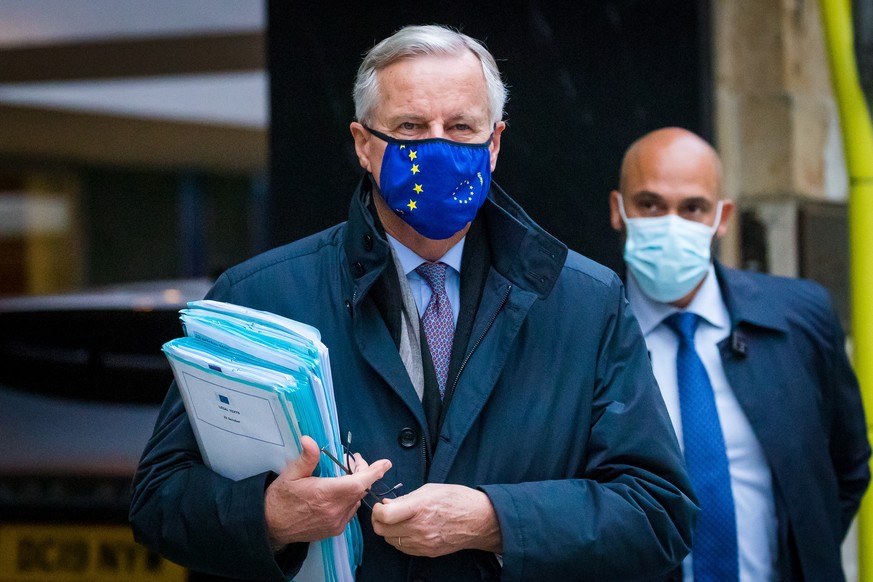 epa08769507 Chief Negotiator Michel Barnier walks from his hotel to a meeting in Westminster ahead for Brexit talks in London, Britain, 24 October 2020. British and EU negotiators are holding talks th ...
