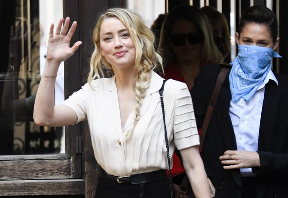 Amber Heard arrives at the High Court, in London, Monday, July 20, 2020. Amber Heard started Monday to give evidence at the High Court in London as part of Johnny Depp���s libel case against The Sun o ...