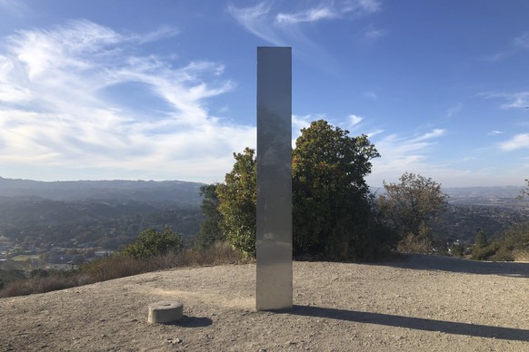 A monolith stands on a Stadium Park hillside in Atascadero, Calif., Tuesday, Dec. 2, 2020. Days after the discovery and swift disappearance of two shining metal monoliths half a world apart, another t ...