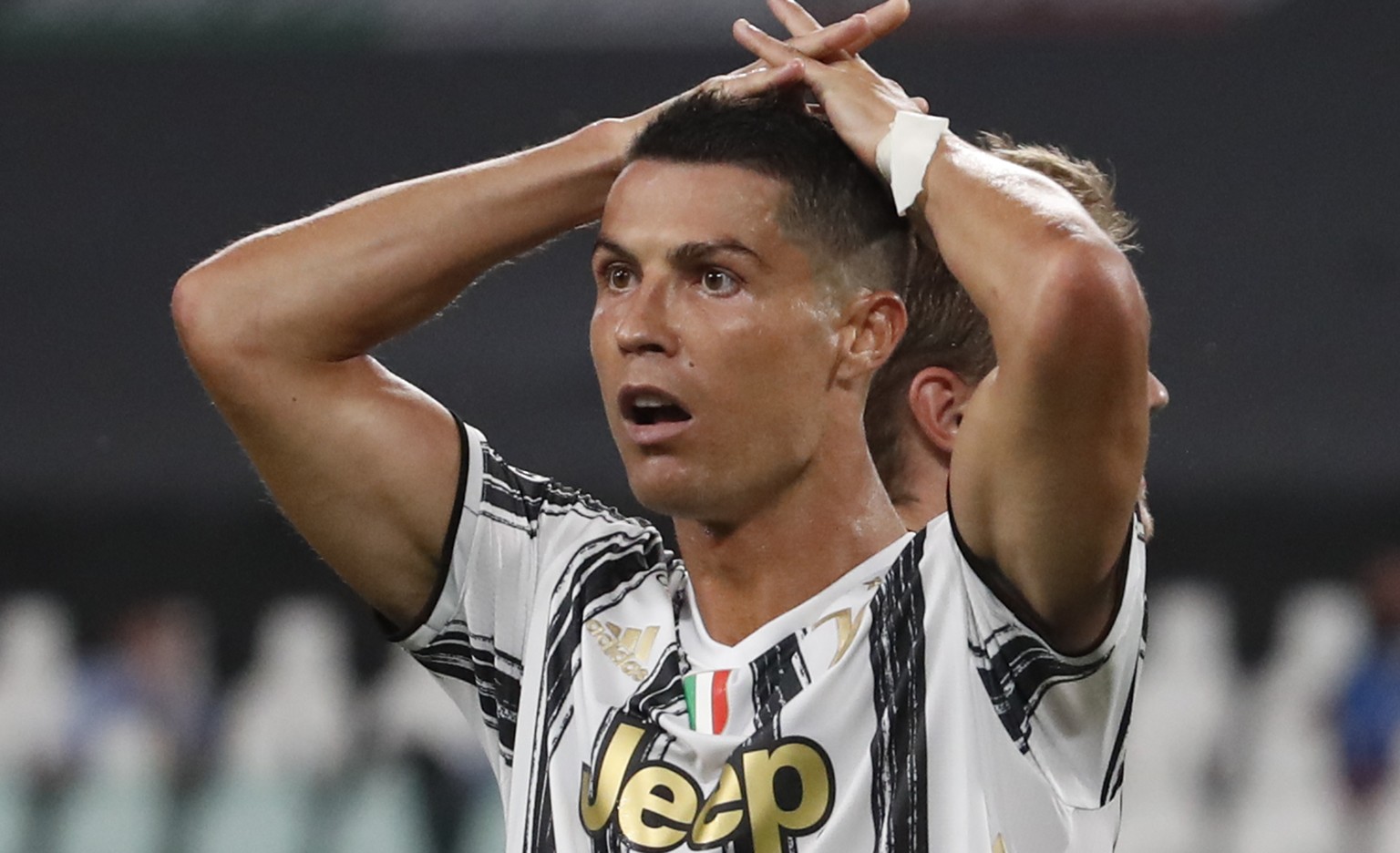 Juventus&#039; Cristiano Ronaldo reacts during the Champions League round of 16 second leg, soccer match between Juventus and Lyon at the Allianz stadium in Turin, Italy, Friday, Aug. 7, 2020. (AP Pho ...