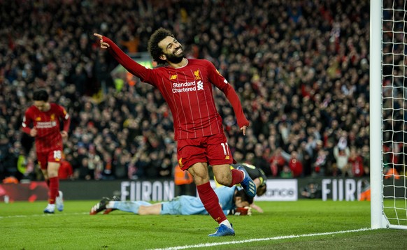 epa08185645 Liverpool&#039;s Mohamed Salah celebrates after scoring the fourth goal during the English Premier League soccer match between Liverpool and Southampton at Anfield, Liverpool, Britain, 01  ...