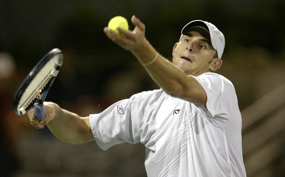 MONTREAL - AUGUST 6: Andy Roddick of the USA serves against Juan Ignacio Chela of Argentina during the second round of the Tennis Masters Series Canada at the du Maurier Stadium on August 6, 2003 in M ...