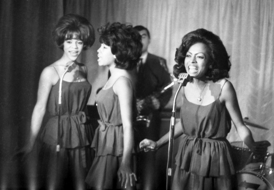 FILE - In this Oct. 8, 1964 file photo, The Supremes, from left, Florence Ballard, Mary Wilson and Diana Ross, perform during a reception for them in a hotel, in London. Wilson, the longest-reigning o ...