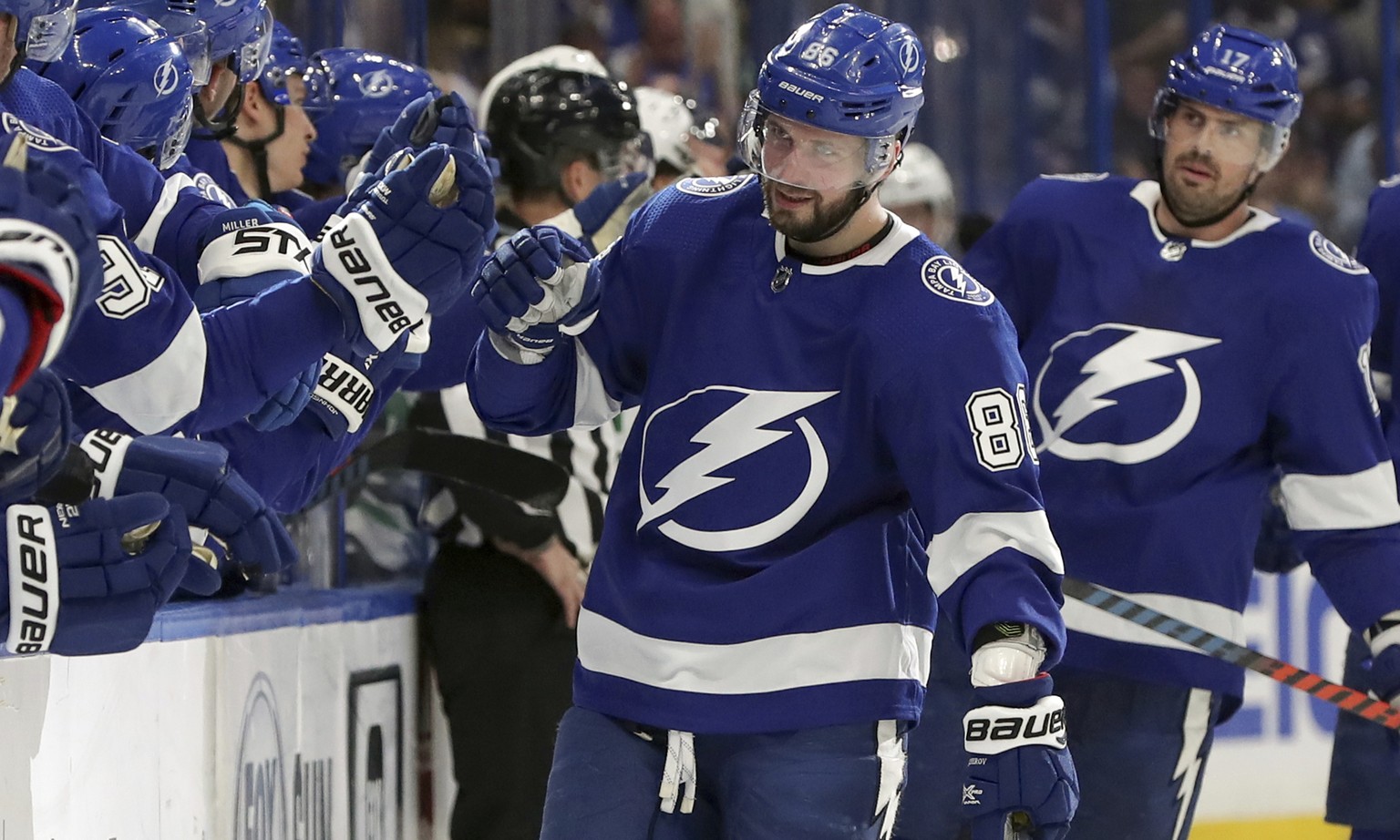Tampa Bay Lightning&#039;s Nikita Kucherov, of Russia, is congratulated for a goal against the Dallas Stars during the first period of an NHL hockey game Thursday, Feb. 14, 2019, in Tampa, Fla. (AP Ph ...