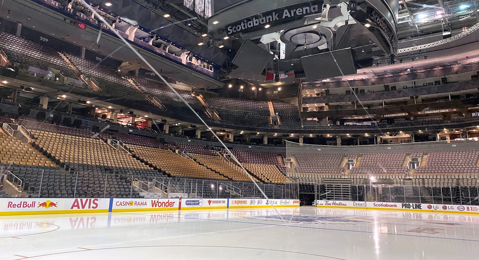 Fresh surfaced ice at Scotiabank Arena, home of the NHL hockey club Toronto Maple Leafs, is shown in Toronto, Thursday, March 12, 2020. The NHL is following the NBAÄôs lead and suspending its season  ...