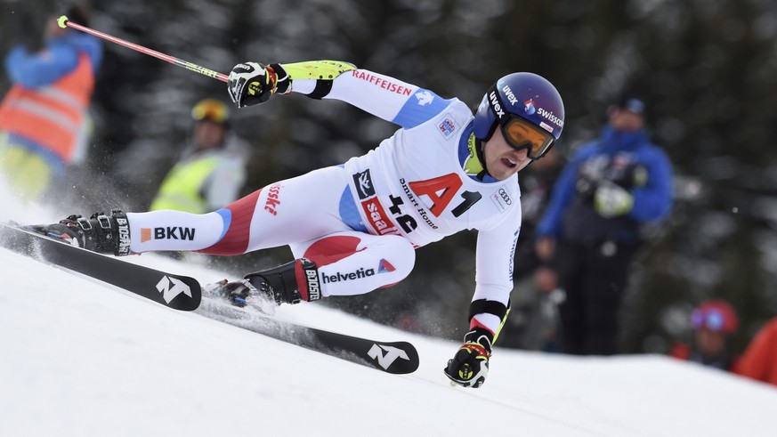 Switzerland&#039;s Cedric Noger speeds down the course during the first run of an alpine ski, men&#039;s World Cup giant slalom in Saalbach-Hinterglemm, Austria, Wednesday, Dec. 19, 2018 (AP Photo/Mar ...
