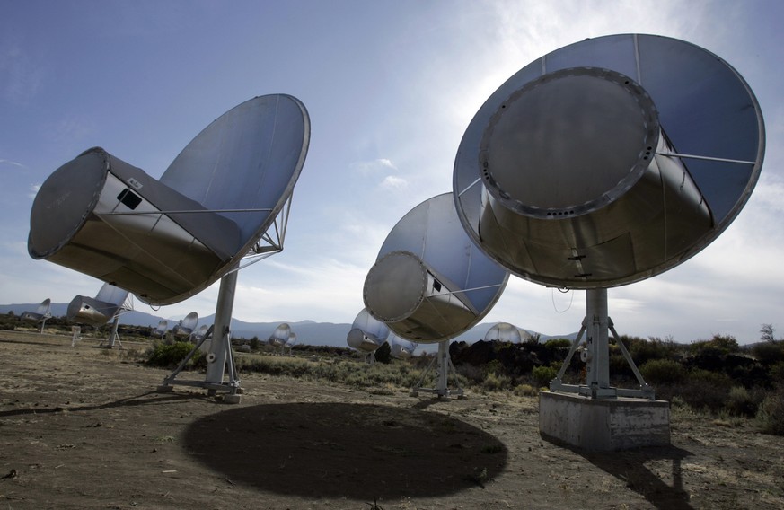 In this Oct. 9, 2007 photo, radio telescopes of the Allen Telescope Array are seen in Hat Creek, Calif. Astronomers at the SETI Institute in Northern California say a steep drop in state and federal f ...
