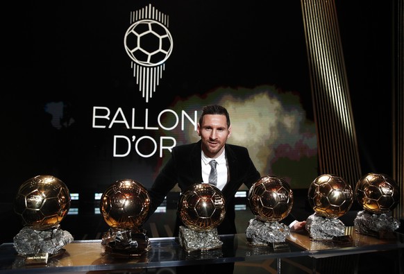 epa08040246 The Men&#039;s 2019 Ballon d&#039;Or winner Barcelona forward Lionel Messi poses with his six Ballon d&#039;Or trophies during the ceremony at Theatre du Chatelet in Paris, France, 02 Dece ...