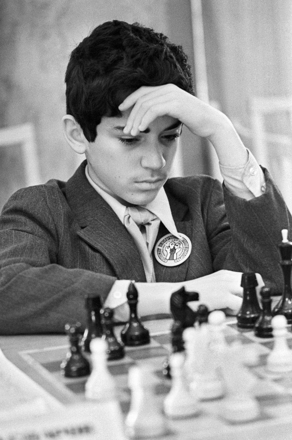 LENNINGRAD, USSR - 1975: 12-year-old chess player Garry Kasparov thinks over his next move at the All-Union Junior Chess Tournament. (Photo by Nikolai Naumenkov\TASS via Getty Images)
