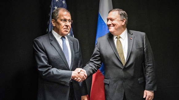 epa07551289 A handout photo made available by Fnland&#039;s Foreign Ministry shows US Secretary of State Mike Pompeo (R) and Russian Foreign Minister Sergei LAvrov (L) shake hands during a press confe ...