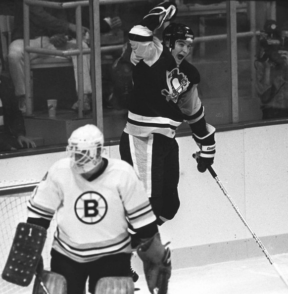Pittsburgh Penguins&#039; Mario Lemieux reacts after scoring his first NHL hockey goal against Boston Bruins goalie Pete Peters in Boston, Oct. 12, 1984. Penguins star and owner Mario Lemieux, one of  ...
